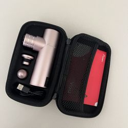 Compact massage gun with multiple heads and travel case