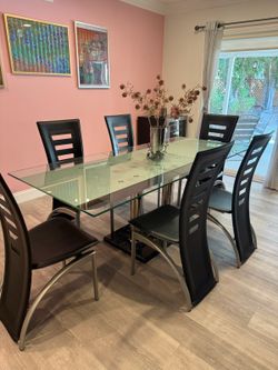 Expanding glass table with marble base