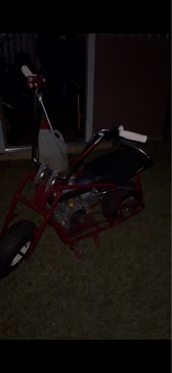 Red Mini Bike Gas Powered