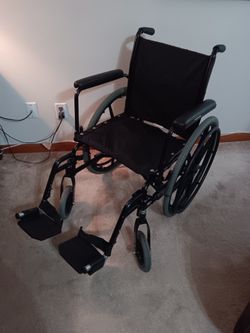 Slim Wheel Chair,like new .