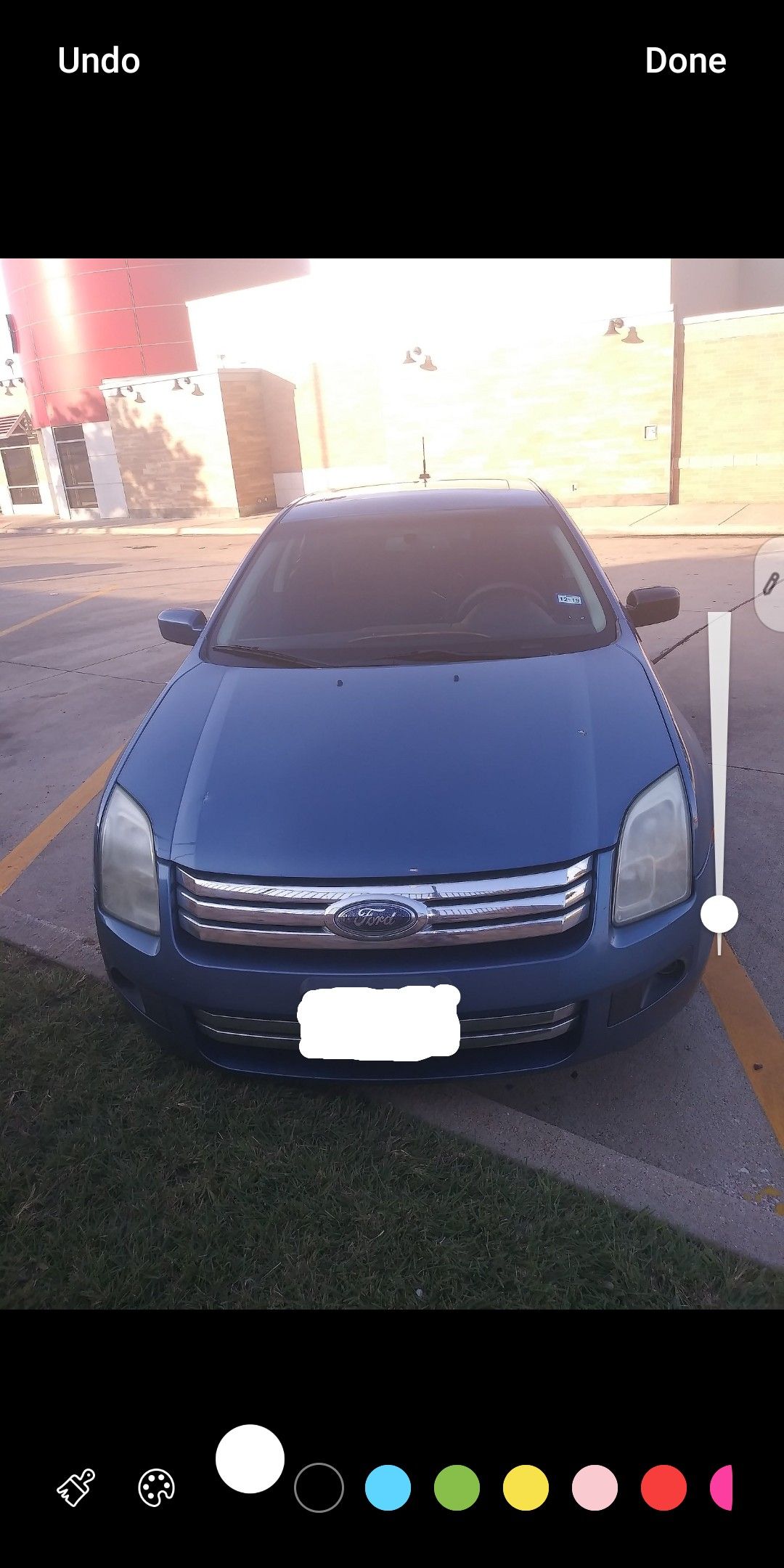 2009 ford fusion with two 12s DB Sub speakers and boss amp