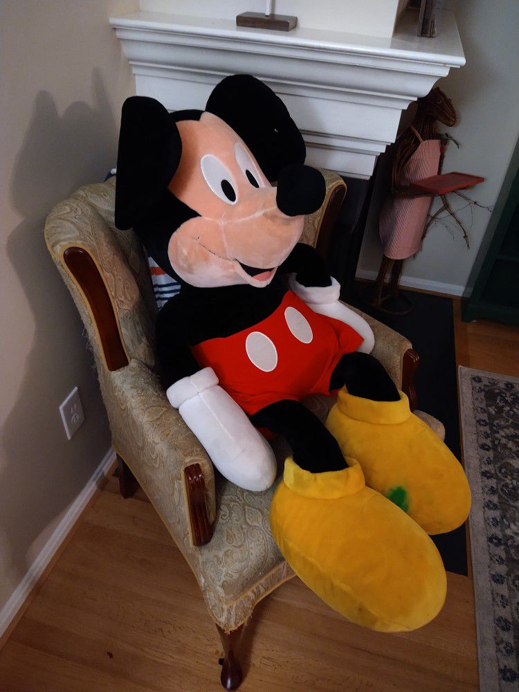 Giant Mickey Mouse plush 48"
Huge Mickey. Heavy too. Great shape other than some marker stain on his shoe as seen in pictures. 

Walt Disney.