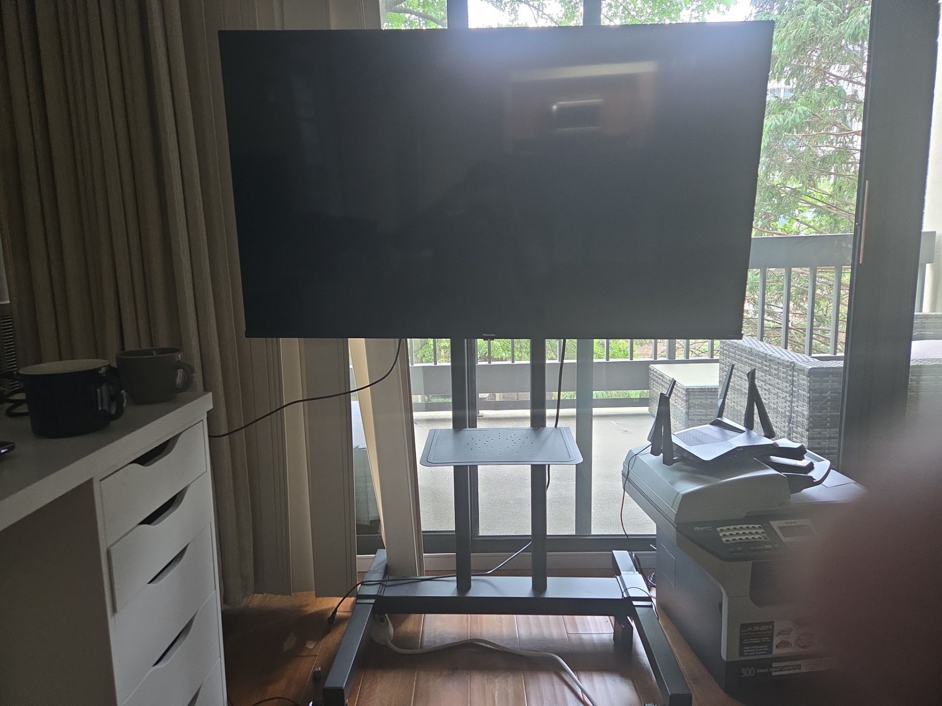 50 inch tv with mobile stand was 1k