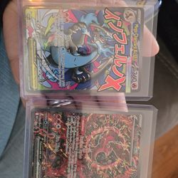 Mega Charzard X and Oricorio Ex 