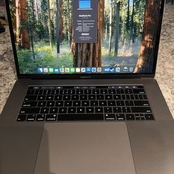 2019 MacBook Pro 15" 16 GB RAM 2.6GHz 6-Core Intel I7 Touch ID and TouchBar