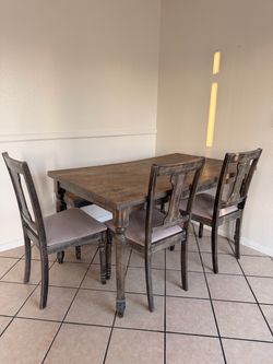 Dining table, chairs, and bench