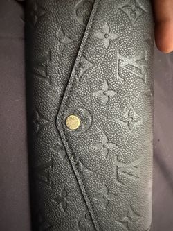 Black Louis Vuitton wallet