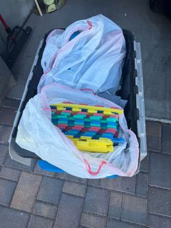 Two bins of kids indoor playground toys