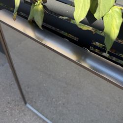 Framed hanging mirrors