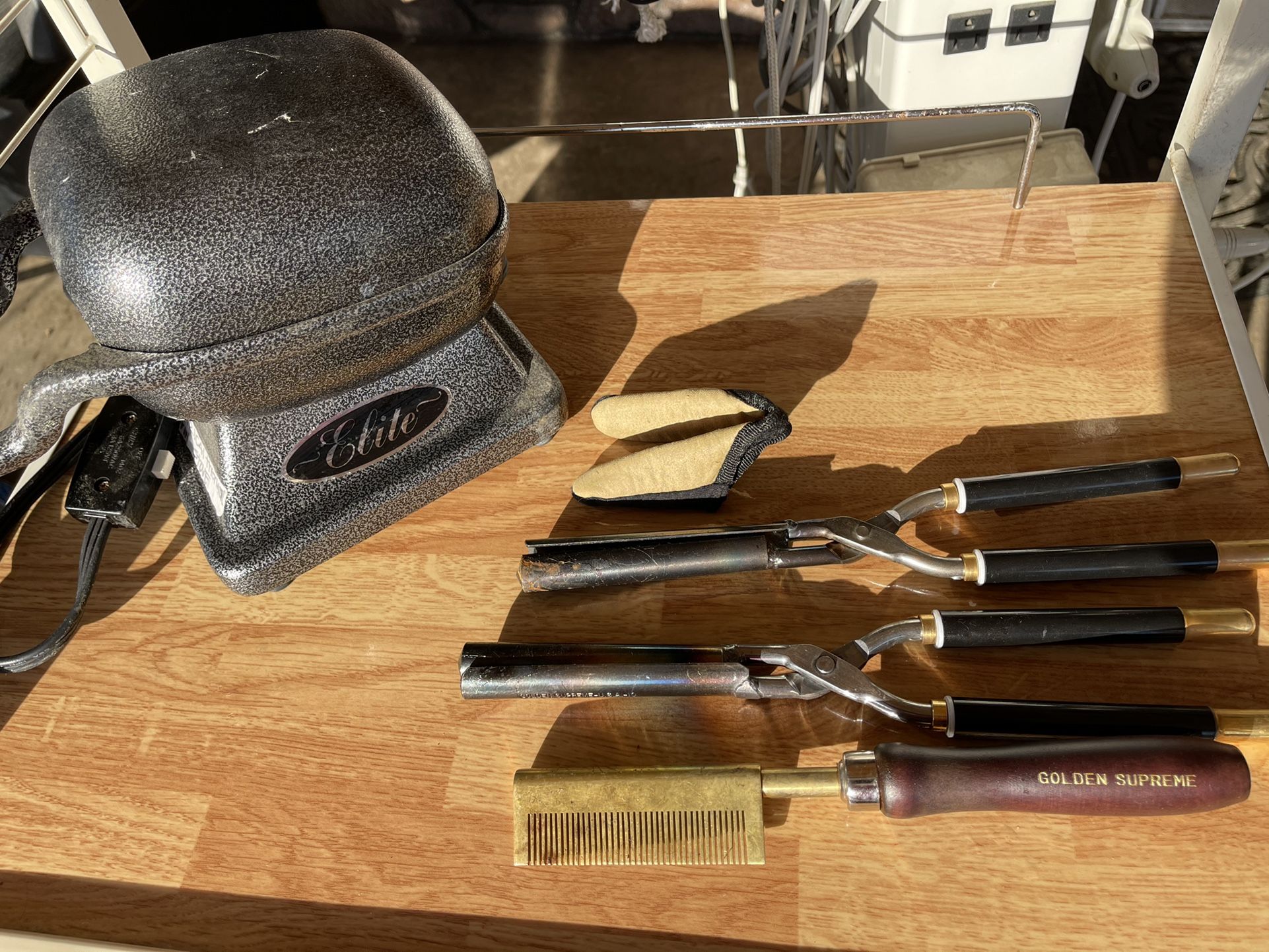 Golden Elite Oven and 2 iron curlers And pressing comb