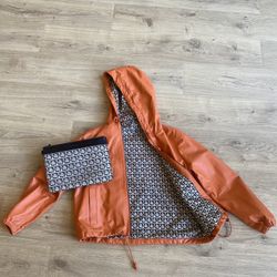 Ferragamo jacket and clutch