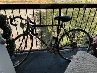 Vintage Schwinn Road Bike with Drop Handlebars and Headlight