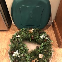 Holiday Wreath with Pine Cones and Decorative Leaves in Storage Tote