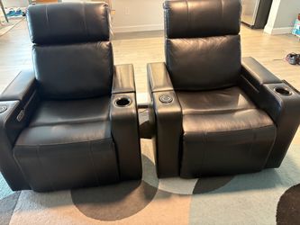 2 Black Power Recliners with separate adjustable head and foot rests