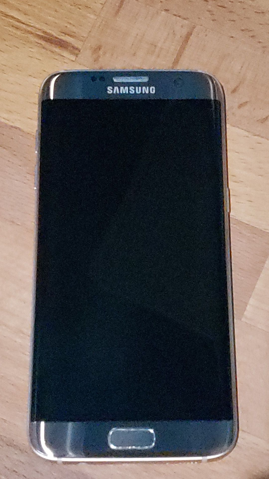 Samsung Galaxy s7 edge w/ phone case.