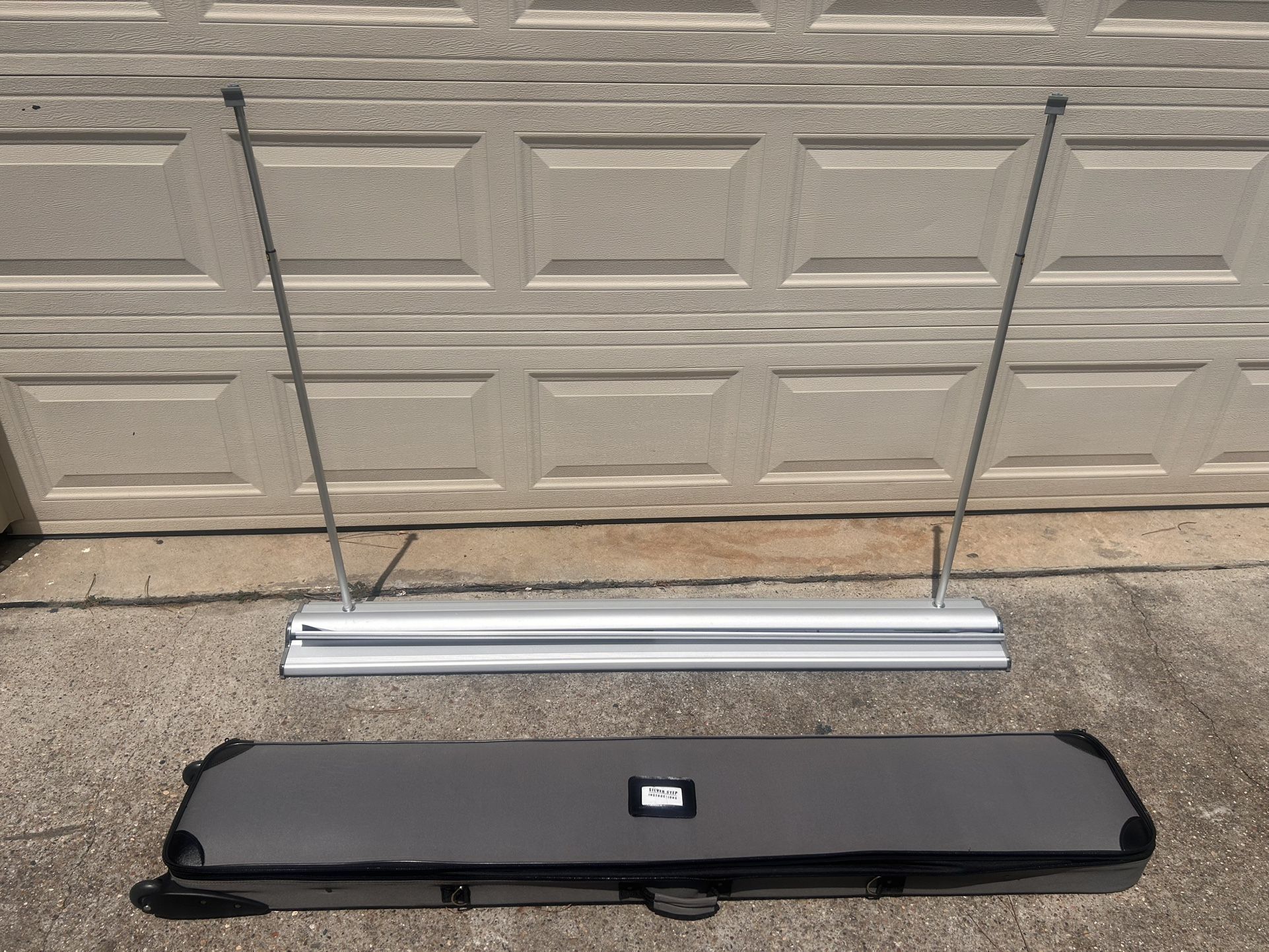 SilverStep® 60 in. w x 69 in. up to 92in. h – Roll Up Banner Stand -Reduced Again I