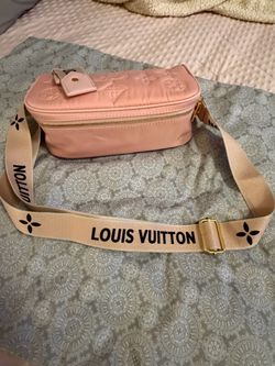 Light pink quilted purse