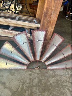 Metal windmill wall decor