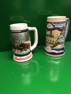 Budweiser and Miller high life steins