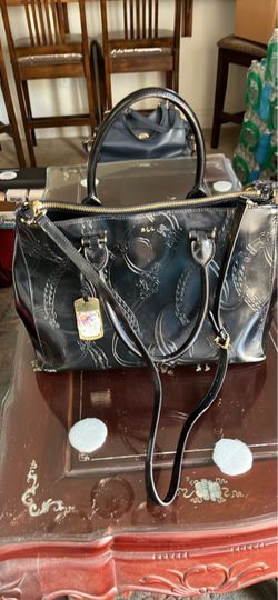 The new R..L. L . Crossbody bag. Long 14 inch, width