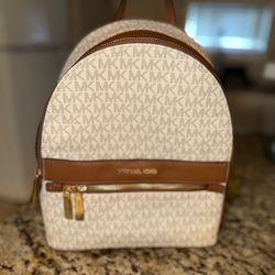 Mk purses, wallet, backpack.