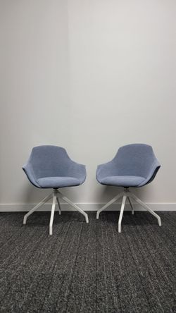 Two contract grade sample swivel chairs.  Excellent condition.