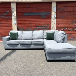 Ashley’s Gray Sectional Sofa Couch with right facing chaise