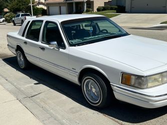 1994 Lincoln town car has been upgraded with new wheels paint has been added to the new control arm  pit arm water pump still runs great