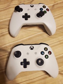 2 White Xbox one S controllers