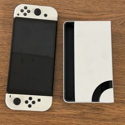 Nintendo Switch OLED with White Joy-Con and Dock