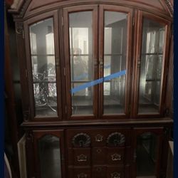 Traditional china cabinet (also called a breakfront or china hutch)