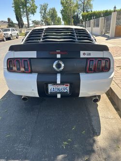 Raxiom Gen5 Tail Lights; Black Housing; Smoked Lens (05-09 Mustang) GT & Base V6