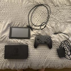 Nintendo Switch 1st Gen W Pro Controller (no Joy-Cons): ~150