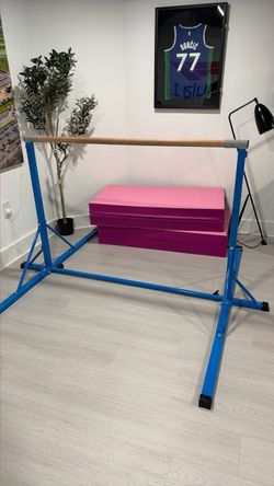 Gymnastic bar and mat
