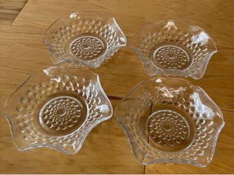 4 Glass scalloped dessert dishes.