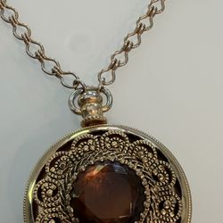 Vintage Avon Perfume Locket with Faux Amber Stone   Chain 30” long  Pendant 1 3/4” long