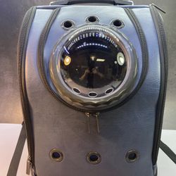 Small/Medium Dark Blue Dog/Cat backpack carrier like new condition. 