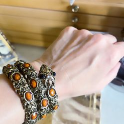 Wraparound snake gemstone bracelet. Tiger eye black onyx. Stunning in person.