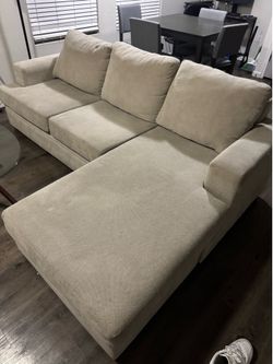 Beige couch with chaise