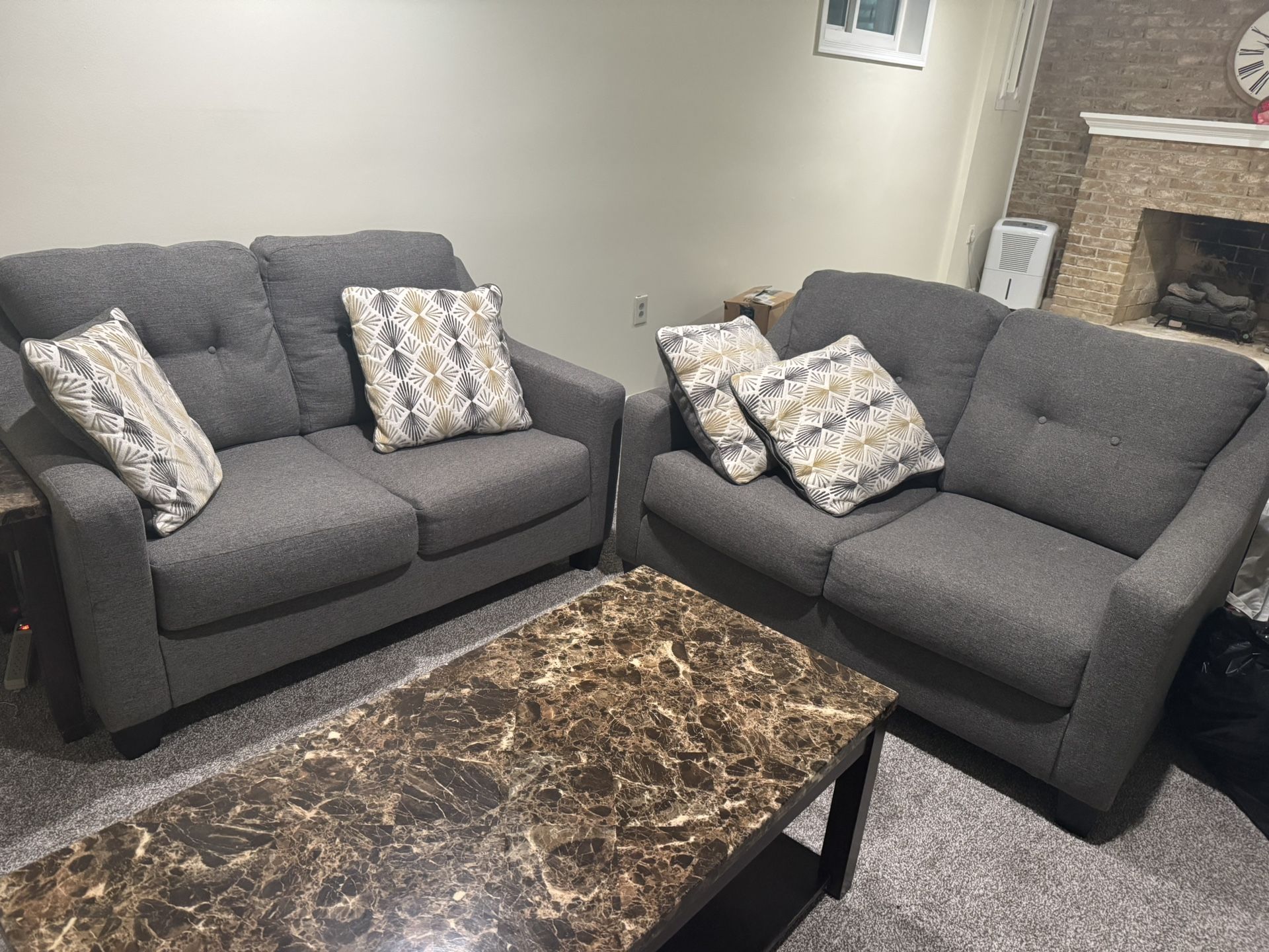 2 Couches And 2 Tables