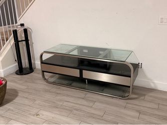 Modern black glass and brushed metal tv stand