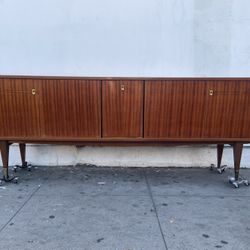 Mid century European long credenza. 
