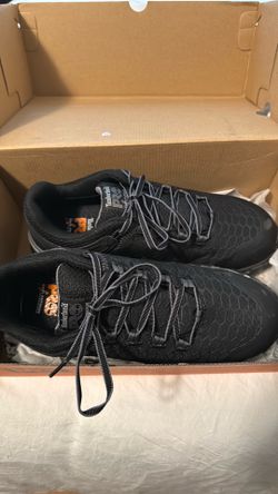 Size 9 steel toe Timbaland shoes and safety vest