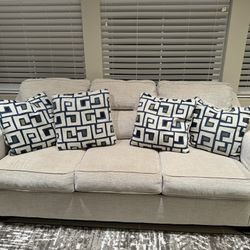 Light Fabric Couch (7‘L X 3’W) and Cushions (4)