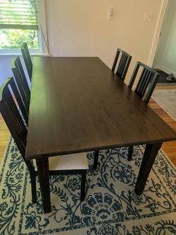 Dark solid pine wood dining table with 5 chairs