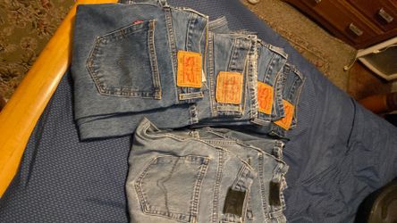 Four pairs of Levi’s jeans, two pairs of Holly Davidson, 32,32s 505. All excellent condition.
