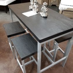 Black And Silver Counter Height Table With 4 stools 