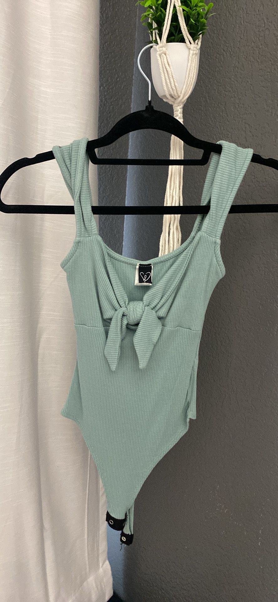 green bodysuit size small