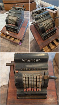 Antique cash register with wood drawer