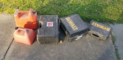 several gas cans and tool boxes